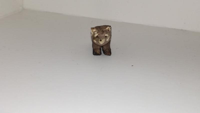 petite sculpture de panda roux