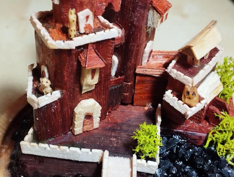 Vue du château avec trois animaux : un lapin m, un renard et Froggelio