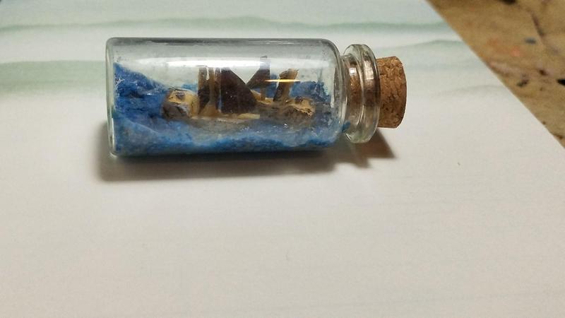 Deux bateaux en bois dans une fiole