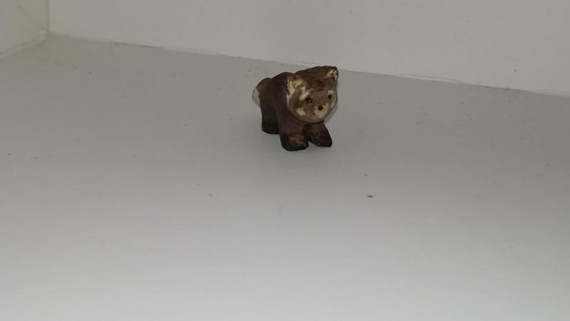 petite sculpture de panda roux