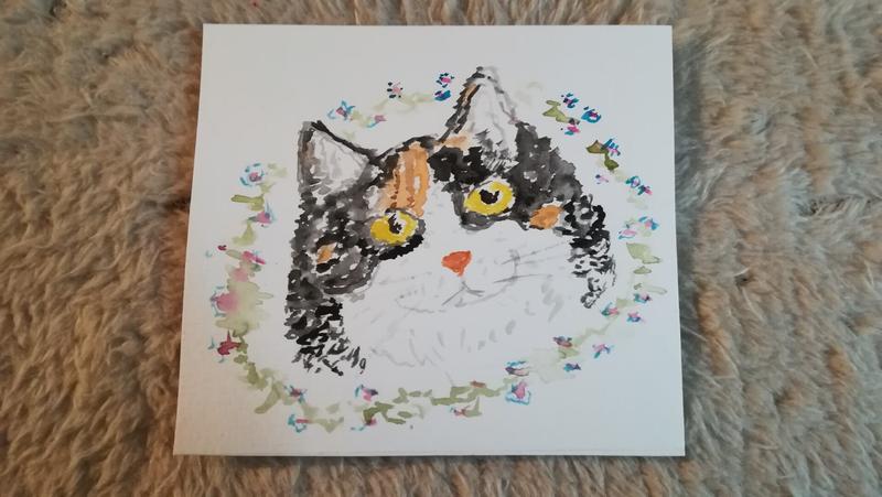 AquarelleTête d'une chatte tricolore entourée d'une couronne de fleurs 